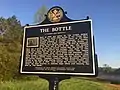 The Auburn Heritage Association held a historic marker dedication for "The Bottle" on April 25, 2015, at the corner of U.S. Highway 280 and Alabama Highway 147 (North College Street), which is the original location of "The Bottle".