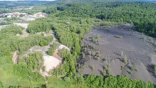 The red slag heap (Ronchamp) on the left and the black slag heap (Magny-Danigon) on the right.