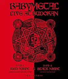 A cover with a circular design in the middle. The worlds "BABYMETAL" and "LIVE AT BUDOKAN" are at the top and "&" and "APOCALYPSE" at the bottom. The left side has black on a red background, with text "DAY-1", "RED NIGHT", and "LEGEND CORSET FESTIVAL EXTRA" on the lower left side. The right side has red on a black background, with text "DAY-2", "BLACK NIGHT", and "LEGEND DOOMSDAY" on the lower right side.