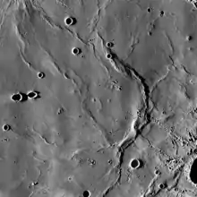 Dorsa Geikie is a prominent wrinkle ridge in Mare Fecunditatis. LRO mosaic.