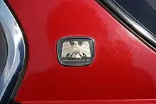 Raptor emblem with text reading "Honda of America Mfg. Inc." below.