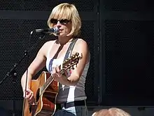 Carol van Dijk, lead singer of Bettie Serveert, performing in Vondelpark in 2006