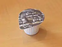 Individual plastic container of coffee creamer, Japan