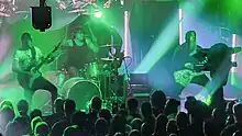 Dance with the Dead performing in Toronto, Ontario, in September 2023 (from left: Tony Kim, tour drummer John Terry, and Justin Pointer)