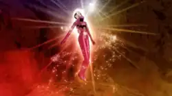 An animated Dua Lipa floating in air with sparkles surrounding her, collecting a jeweled heart which is floating