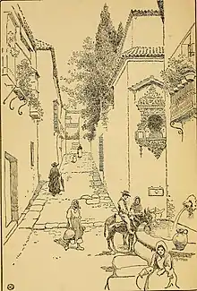 A line illustration of a village lane, from a 1917 book about Spain.