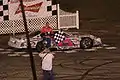 Kreyer in victory lane at Golden Sands Speedway in 2013