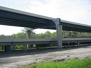Two different girder bridges. The top is a plate girder bridge, while the bottom is a concrete girder bridge.