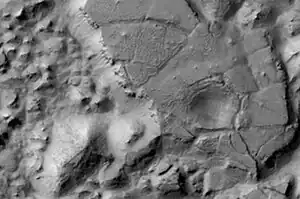 Gorgonum Chaos as seen by Mars Reconnaissance Orbiter HiRISE. Image about 4 km wide.