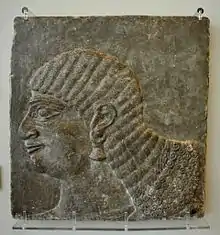 Head of a royal attendant. From the North-West Palace at Nimrud, Iraq. Reign of Ashurnasirpall II, 883–859 BCE