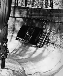 Henry Taylor driving a Ford Cortina down the bobsleigh run (auto-bobbing)