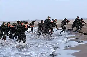 IRGCN frogmen equipped with T9 and Z-84 submachine guns in an amphibious exercise of Great Prophet IX war games exercise
