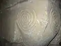 Arch support carved with ammonites