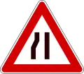 Road narrows on left