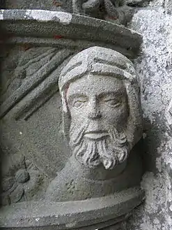Carving on the stoup by south porch