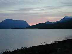 Lochan Fada at sunset. In the distance are Beinn Lair on the left and A' Mhaighdean on the right.