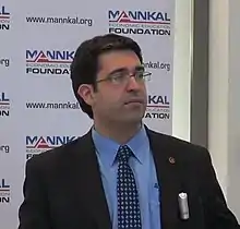 Man in glasses wearing suit