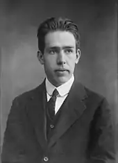 Image 6Niels Bohr (1885–1962) was a Danish physicist who made foundational contributions to understanding atomic structure and quantum theory, for which he received the Nobel Prize in Physics in 1922. Bohr was also a philosopher and a promoter of scientific research.