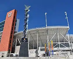 2002 Olympic cauldron with stadium in background