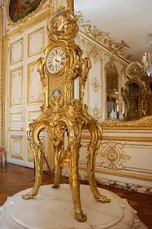 Astronomical clock of gilded bronze by Jacques Caffieri (1754), Museum of Versailles