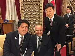Ryuko Hira with Prime Minister of Japan H.E. Shinzo Abe and Minister of Economy, Trade, and Industry of Japan H.E. Yasutoshi Nishimura