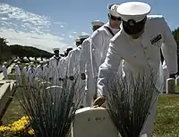 Sailors of USS Michael Monsoor pays respect to the grave of Michael Monsoor on 29 September 2016.