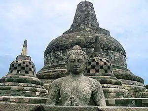 Buddha in the exposed stupa of Borobudur mandala, Central Java, Indonesia, c. 825.