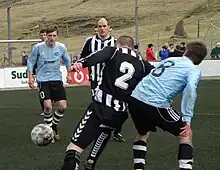 Image 1TB Tvøroyri is the oldest football club of the Faroe Islands, it was founded in 1892. Óli Johannesen (in black/white) holds the record for most capped player of the Faroe Islands national football team. Here TB plays against Víkingur Gøta. (from Culture of the Faroe Islands)