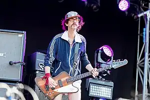 Poullain performing with The Darkness in 2018