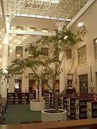 The Tucson High School Galleria and reflexive library (pictured) feature a modern atrium tetrastylum with four support columns and open roof