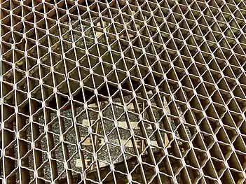 The bridge's steel grate road deck.